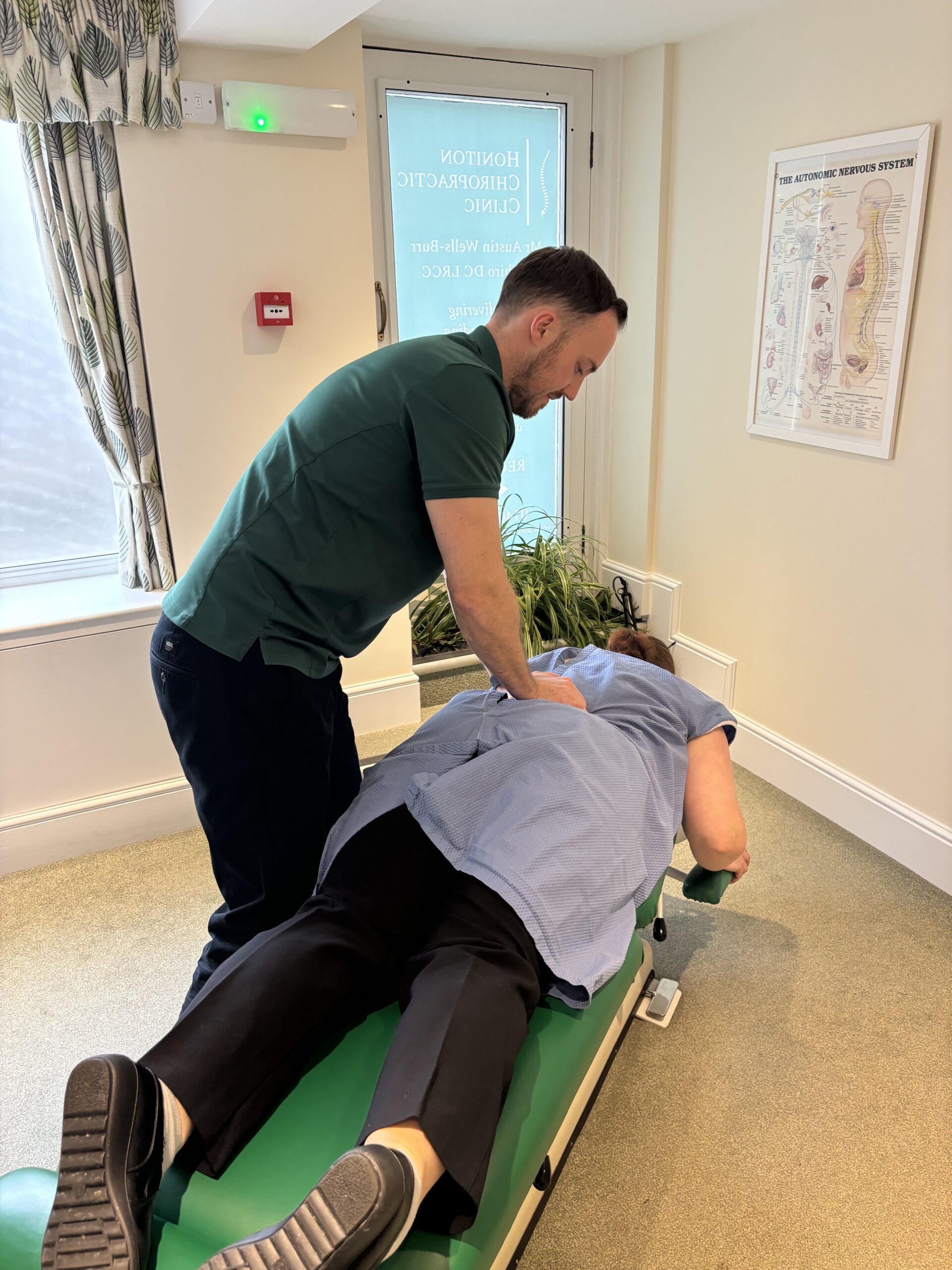 Chiropractor adjustment for patient in Honiton To treat sciatica